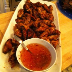 Grilled or oven roasted, these are magical, disappearing chicken wings, especially with the brilliant Thai dipping sauce on the side.